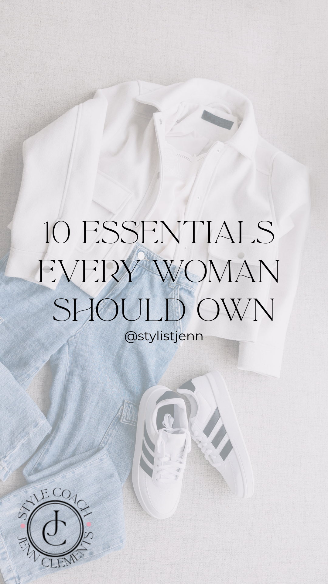 Flat lay of classic wardrobe essentials for women including a white jacket, lace blouse, light-wash jeans, and white Adidas sneakers with black stripes.